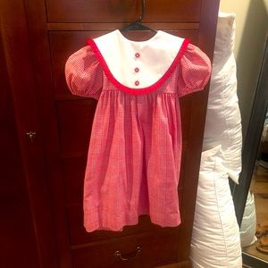 Monday’s Child red and white dress.